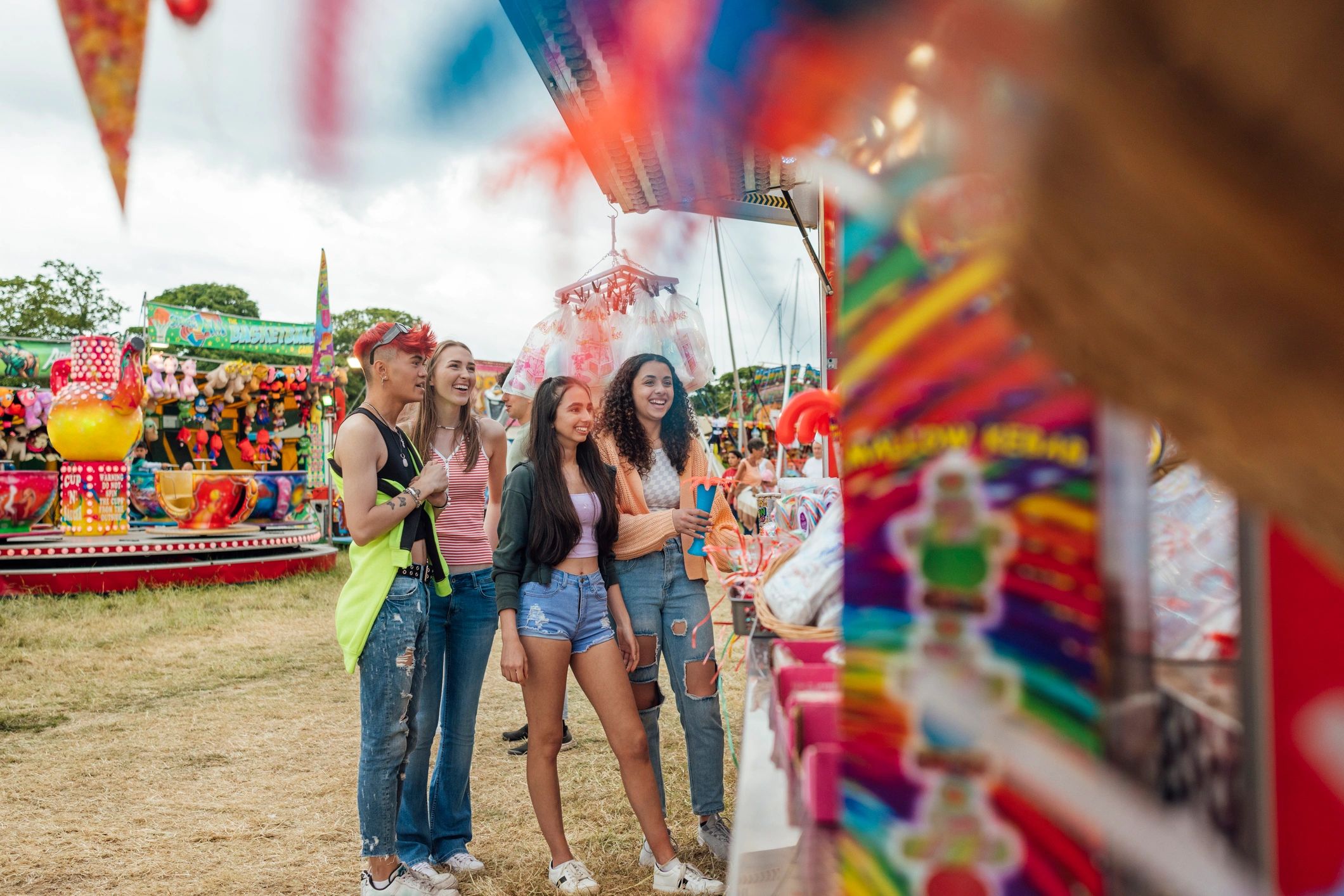 People gathered at a lively market stall